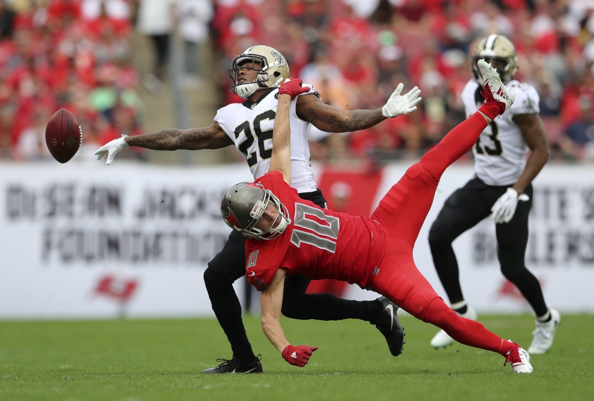 Dec 9, 2018; Tampa, FL, USA; New Orleans Saints cornerback P.J. Williams (26) defends the pass intended for Tampa Bay Buccaneers wide receiver Adam Humphries (10) during the first half at Raymond James Stadium. Mandatory Credit: Kevin Jairaj-USA TODAY