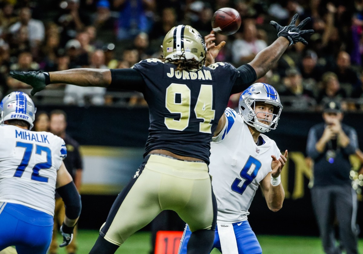 Oct 15, 2017; New Orleans, LA, USA; Detroit Lions quarterback Matthew Stafford (9) is pressured by New Orleans Saints defensive end Cameron Jordan (94) during the second half of a game at the Mercedes-Benz Superdome. The Saints defeated the Lions 52-38. Mandatory Credit: Derick E. Hingle-USA TODAY