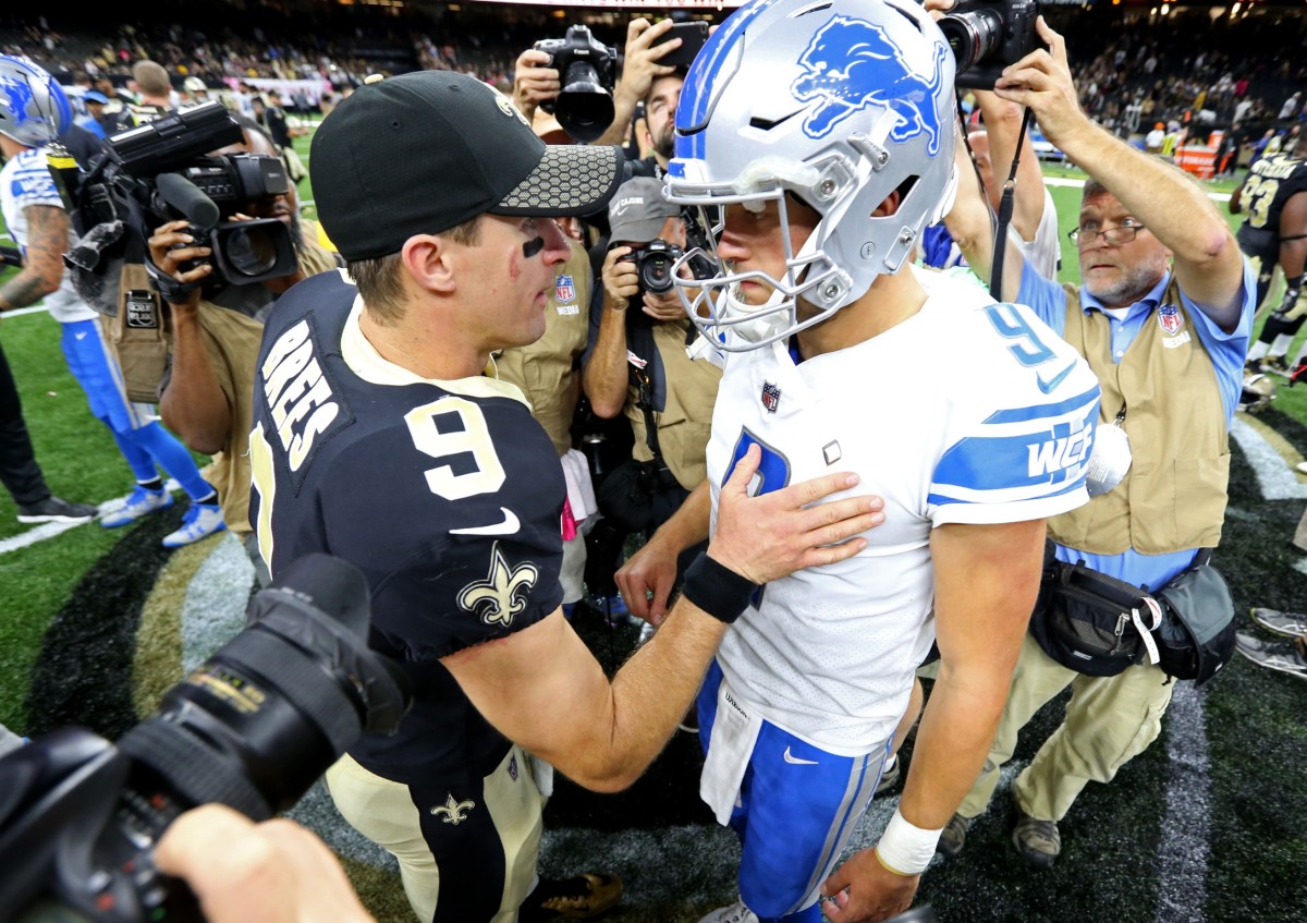 Oct 15, 2017; New Orleans, LA, USA; New Orleans Saints quarterback Drew Brees (9) talks to Detroit Lions quarterback Matthew Stafford (9) after their game at the Mercedes-Benz Superdome. Saints won, 52-38. Mandatory Credit: Chuck Cook-USA TODAY Sports