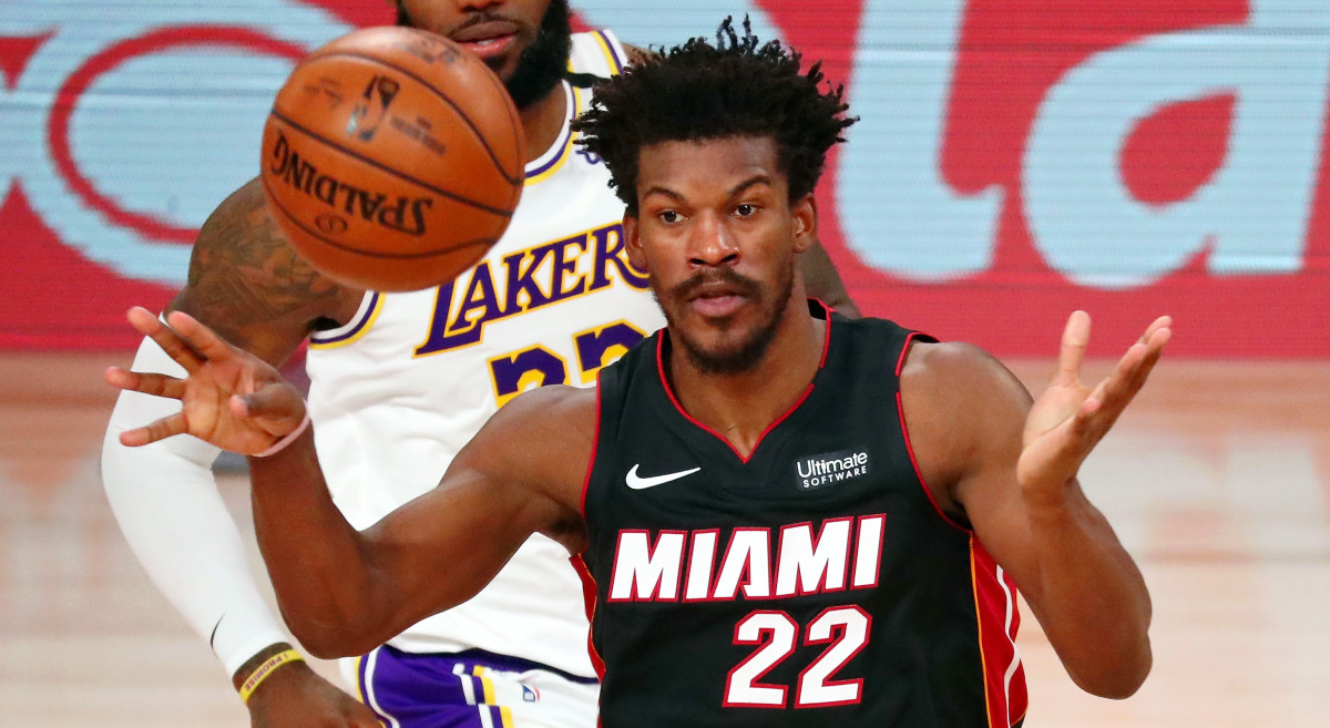 Miami Heat forward Jimmy Butler (22) passes the ball against the Los Angeles Lakers during the third quarter of game three of the 2020 NBA Finals at AdventHealth Arena.