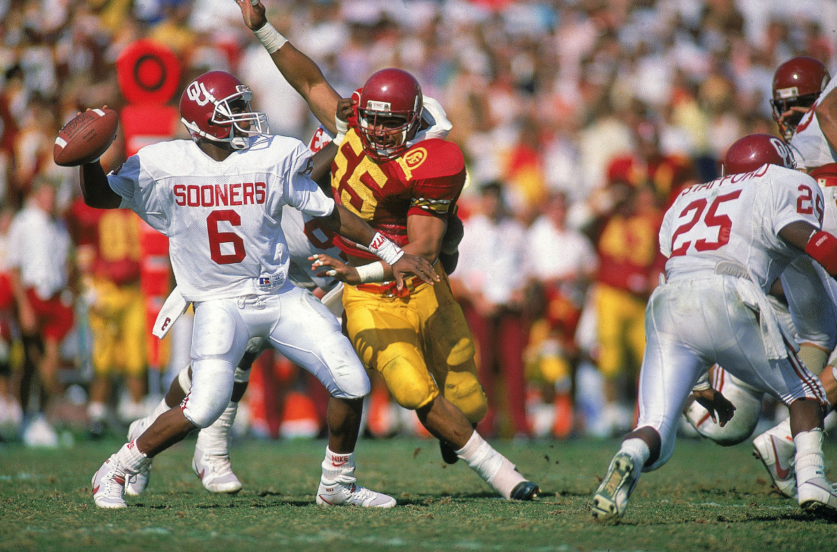 Seau gets after quarterback Charles Thompson in a USC upset of Oklahoma, in 1988.