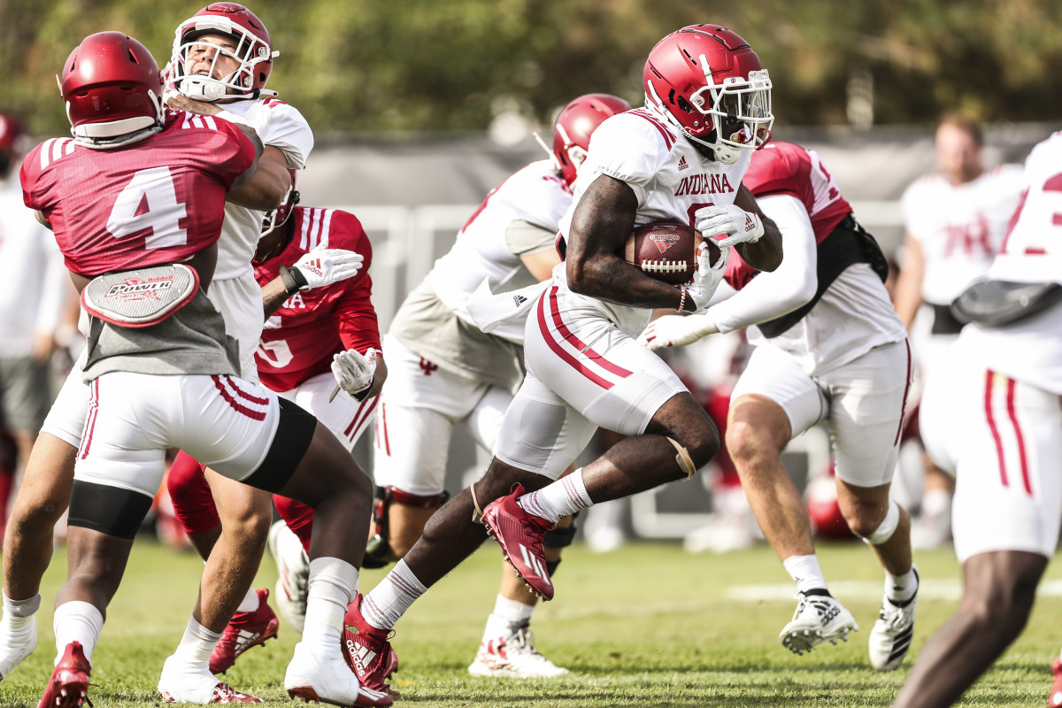 Stevie Scott carries the ball during Indiana's practice on Sept. 30.