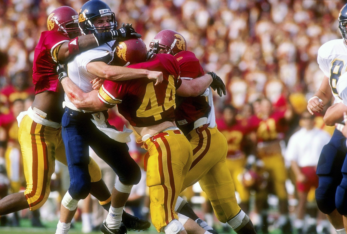 Webb (44) attacking Cal quarterback David Barr in 1992.