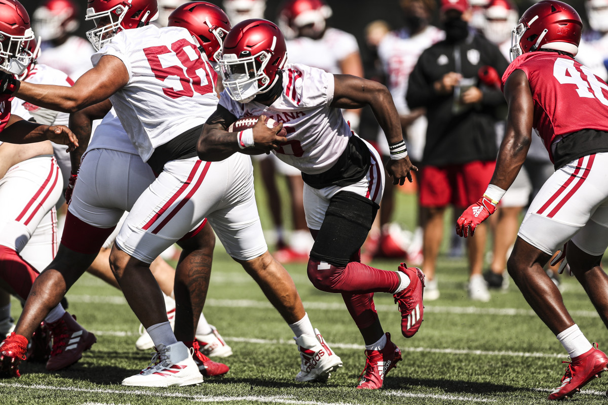 Sophomore Sampson James carries the ball during one of Indiana's fall practices.