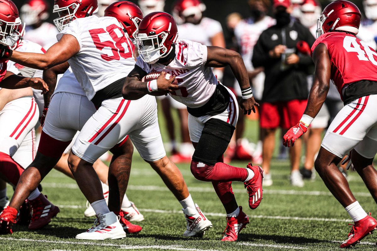 Sophomore Sampson James carries the ball during one of Indiana's fall practices.