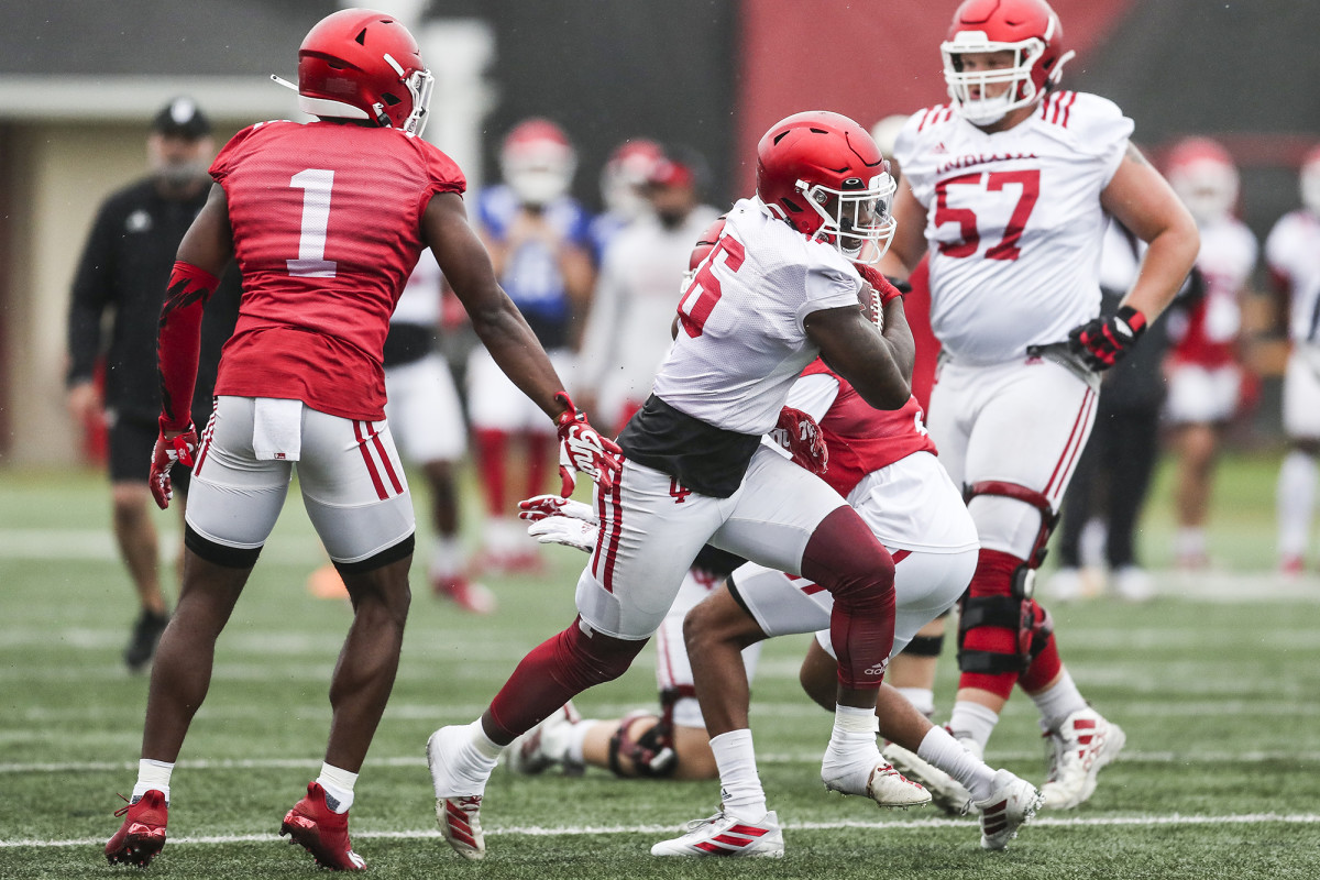 Indiana sophomore running back Sampson James carries the ball during Indiana's fall practice on Sept. 30.