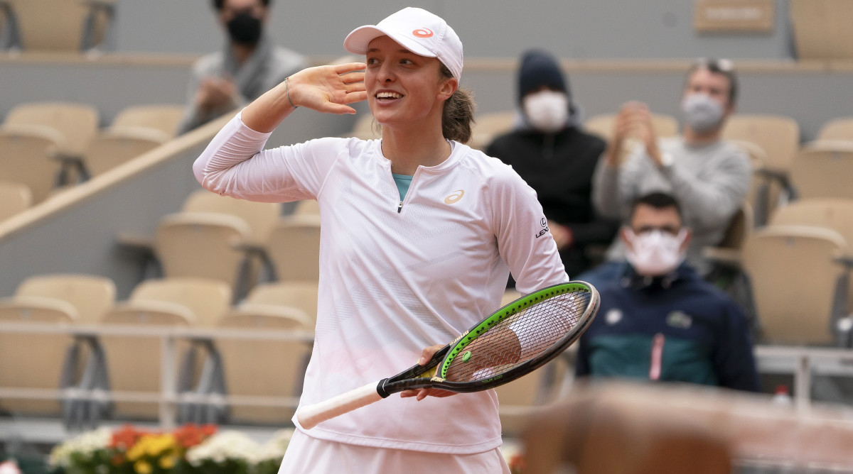 Oct 8, 2020; Paris, France; Iga Swiatek (POL) celebrates match point during her match against Nadia Podoroska (ARG) on day 12 at Stade Roland Garros.