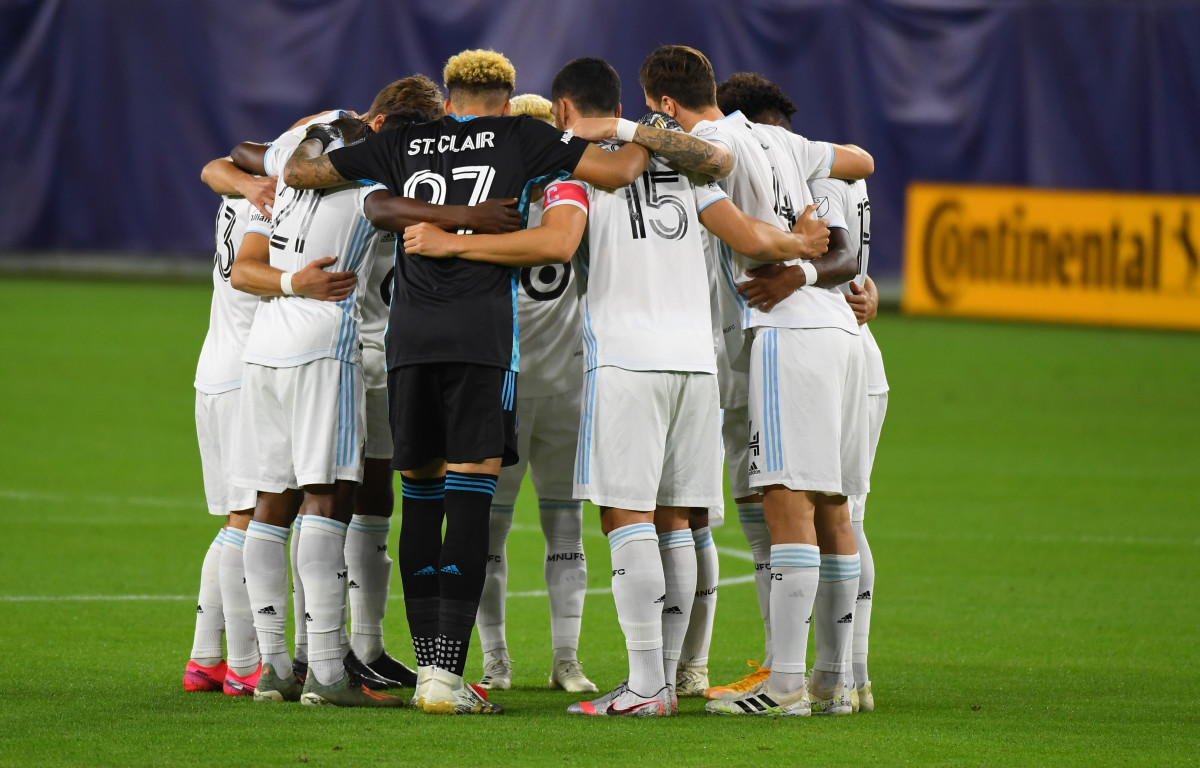 Minnesota United players huddle before the match against the Nashville SC at Nissan Stadium.