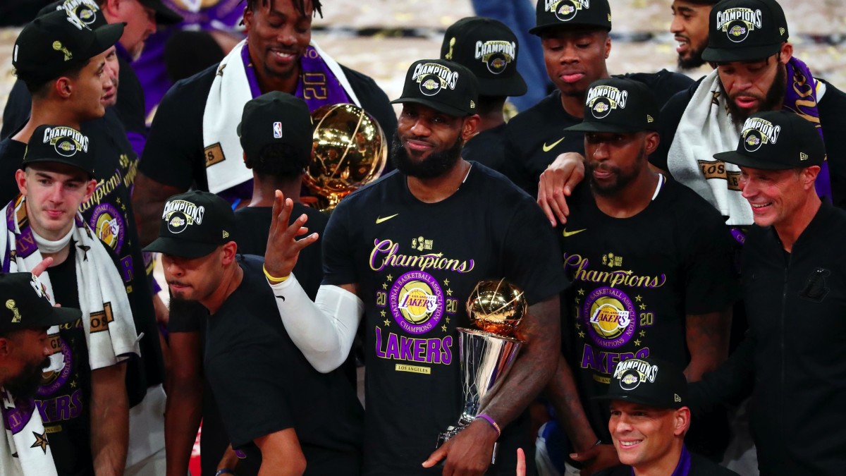 Los Angeles Lakers forward LeBron James (23) holds up four fingers after winning his fourth NBA championship after game six of the 2020 NBA Finals at AdventHealth Arena. The Los Angeles Lakers won 106...