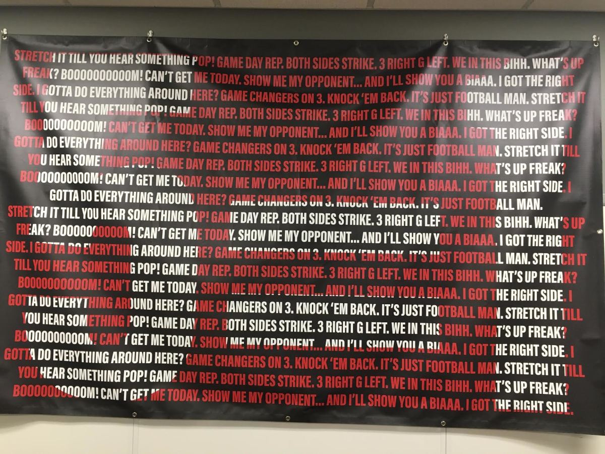 DJ Looney's most common quotes are on the wall of the program's offensive line meeting room.