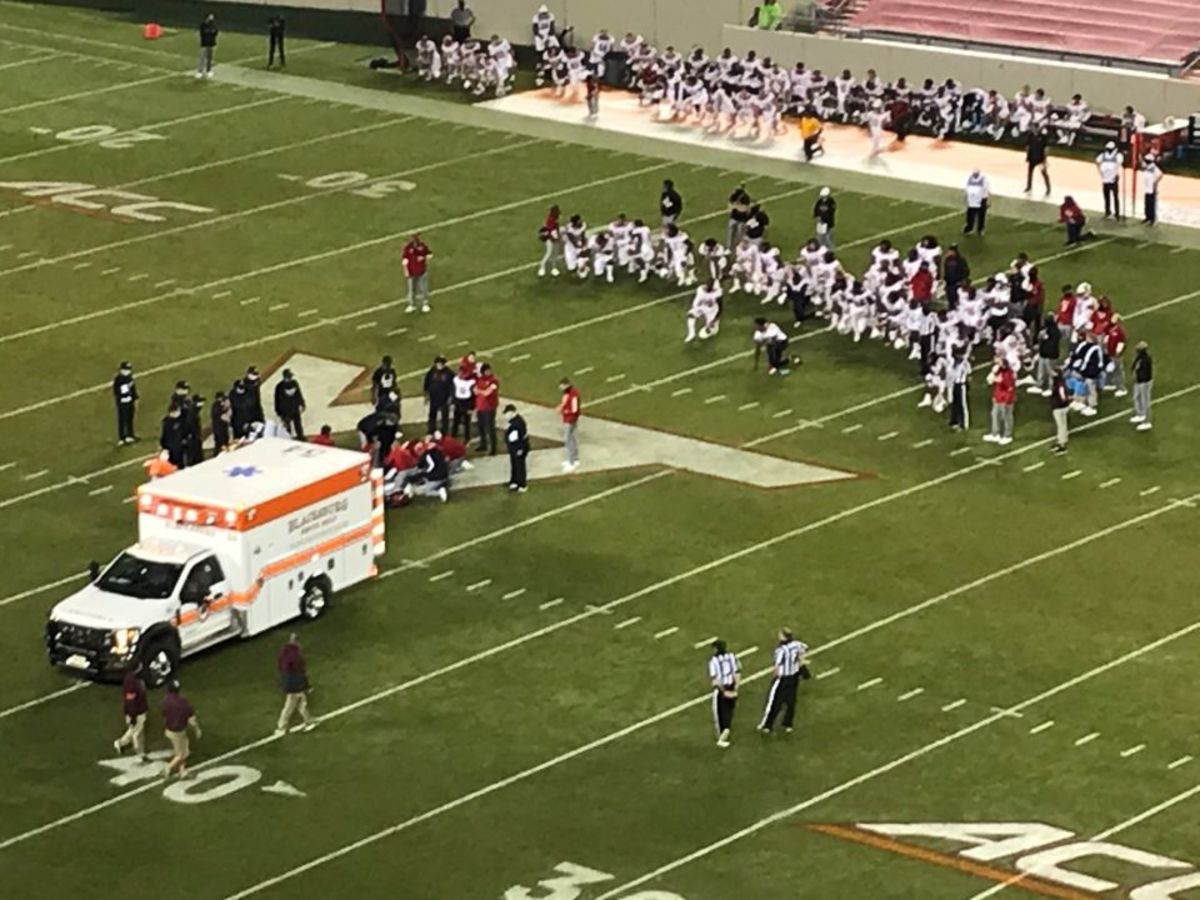 Khalid Martin is taken from the field at Virginia Tech in an ambulance