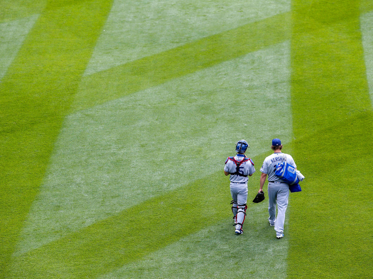 Clayton Kershaw walking with a teammate