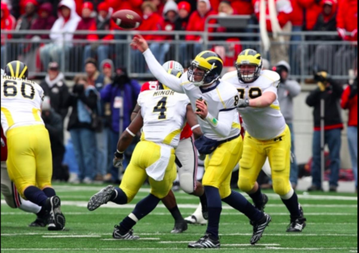 Nick Sheridan throws a pass for Michigan in a game against Ohio State in 2008. (USA TODAY Sports)