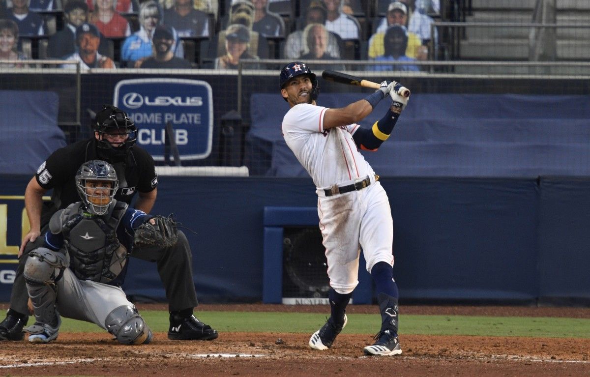 Houston Astros shortstop Carlos Correa (1) hits a game winning home run against the Tampa Bay Rays in the ninth inning during Game 5. (Robert Hanashiro-USA TODAY Sports)