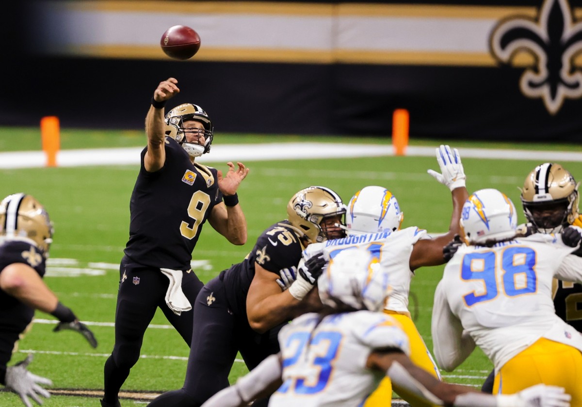 Oct 12, 2020; New Orleans, Louisiana, USA; New Orleans Saints quarterback Drew Brees (9) throws against the Los Angeles Chargers during the first quarter at the Mercedes-Benz Superdome. Mandatory Credit: Derick E. Hingle-USA TODAY