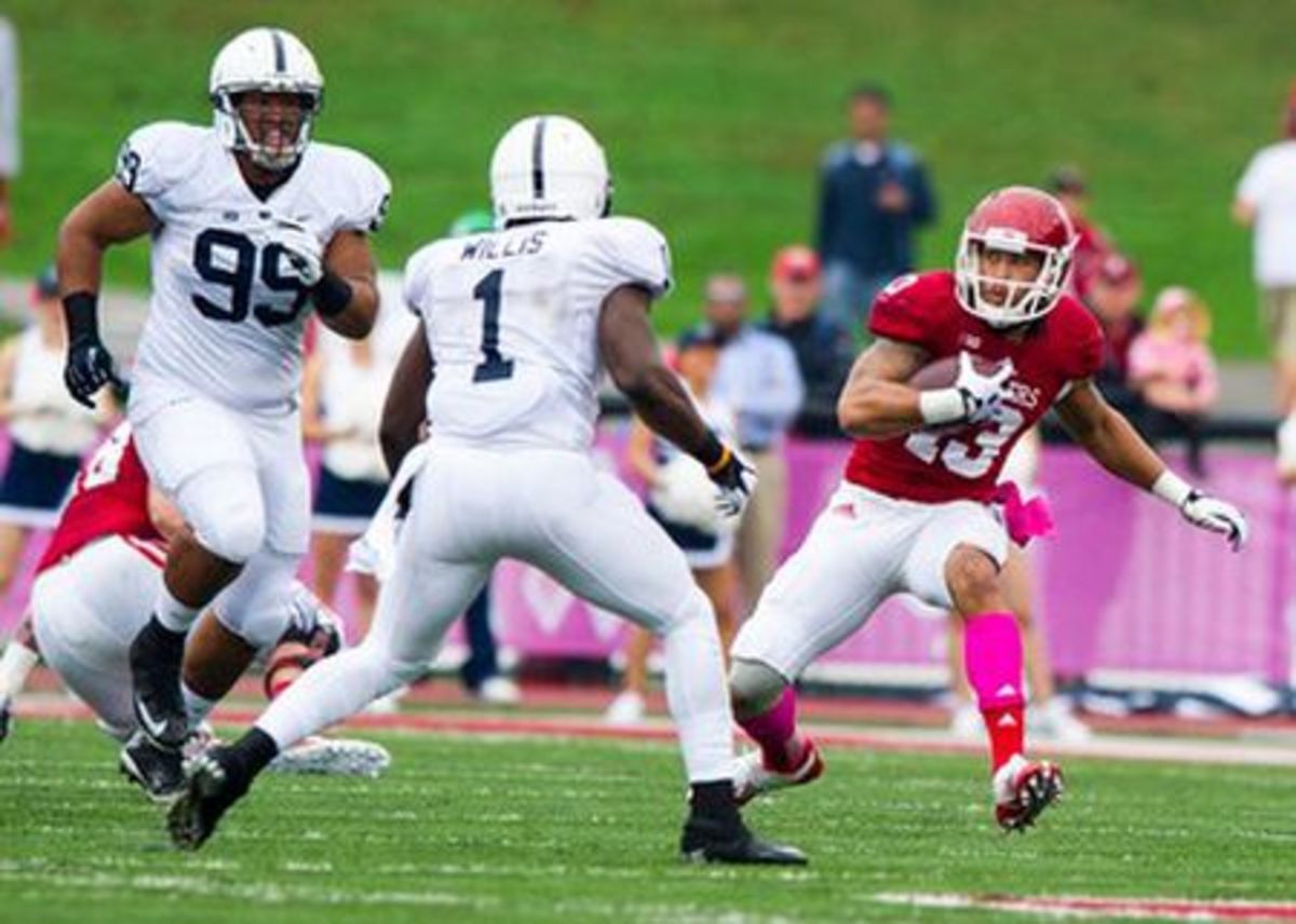 Kofi Hughes catches a pass during the Indiana versus Penn State game in 2013.