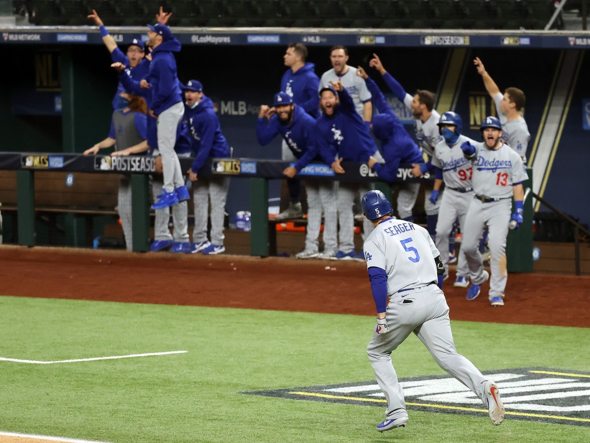 Oct 16, 2020; Arlington, Texas, USA; Los Angeles Dodgers shortstop Corey Seager (5) celebrates his two run homerun against the Atlanta Braves during the seventh inning in game five of the 2020 NLCS at Globe Life Field. Mandatory Credit: Kevin Jairaj-USA TODAY Sports