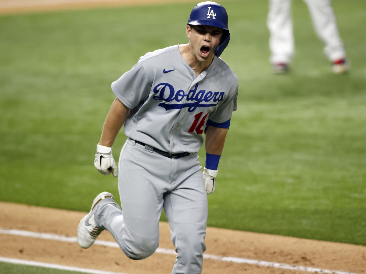 Oct 16, 2020; Arlington, Texas, USA; Los Angeles Dodgers catcher Will Smith (16) reacts as he runs down the first baseline on his three run homerun against the Atlanta Braves during the sixth inning in game five of the 2020 NLCS at Globe Life Field.