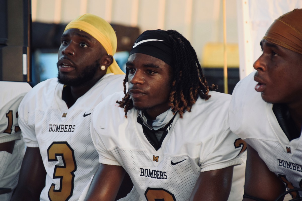 Makael Smith sitting between two Midwest City teammates feels the Bombers could be champions this season. 