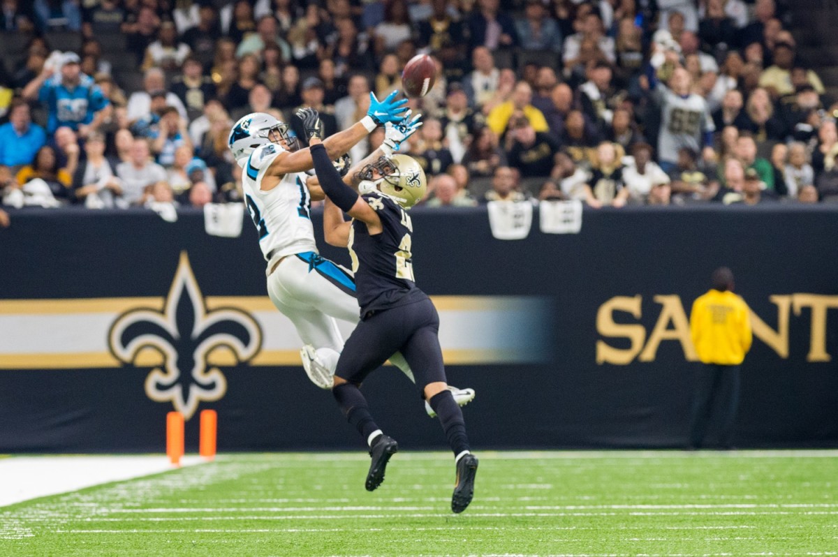 Saints corner back Marshon Lattimore breaks up a pass to Panthers receiver DJ Moore in the Mecedes-Benz Superdome. Sunday, Dec. 30, 2018 © SCOTT CLAUSE/USA TODAY Network