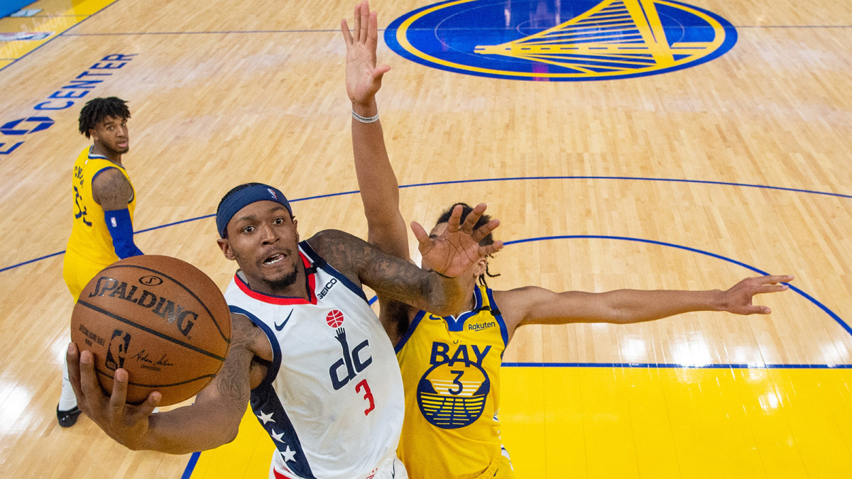 Washington Wizards guard Bradley Beal shoots the basketball against Golden State Warriors guard Jordan Poole