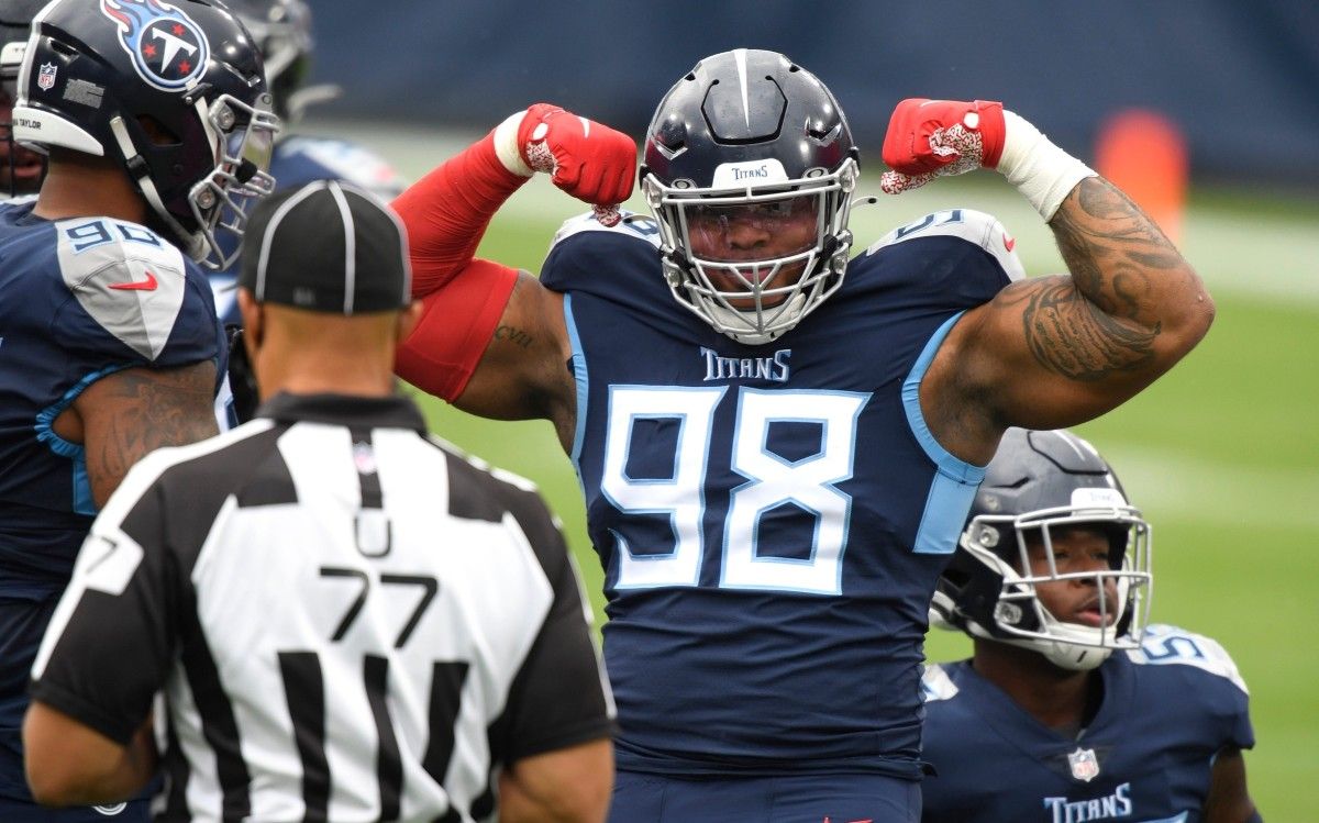 Tennessee Titans defensive tackle Jeffery Simmons (98) celebrates a tackle during the first quarter at Nissan Stadium Sunday, Oct. 18, 2020 in Nashville, Tenn.