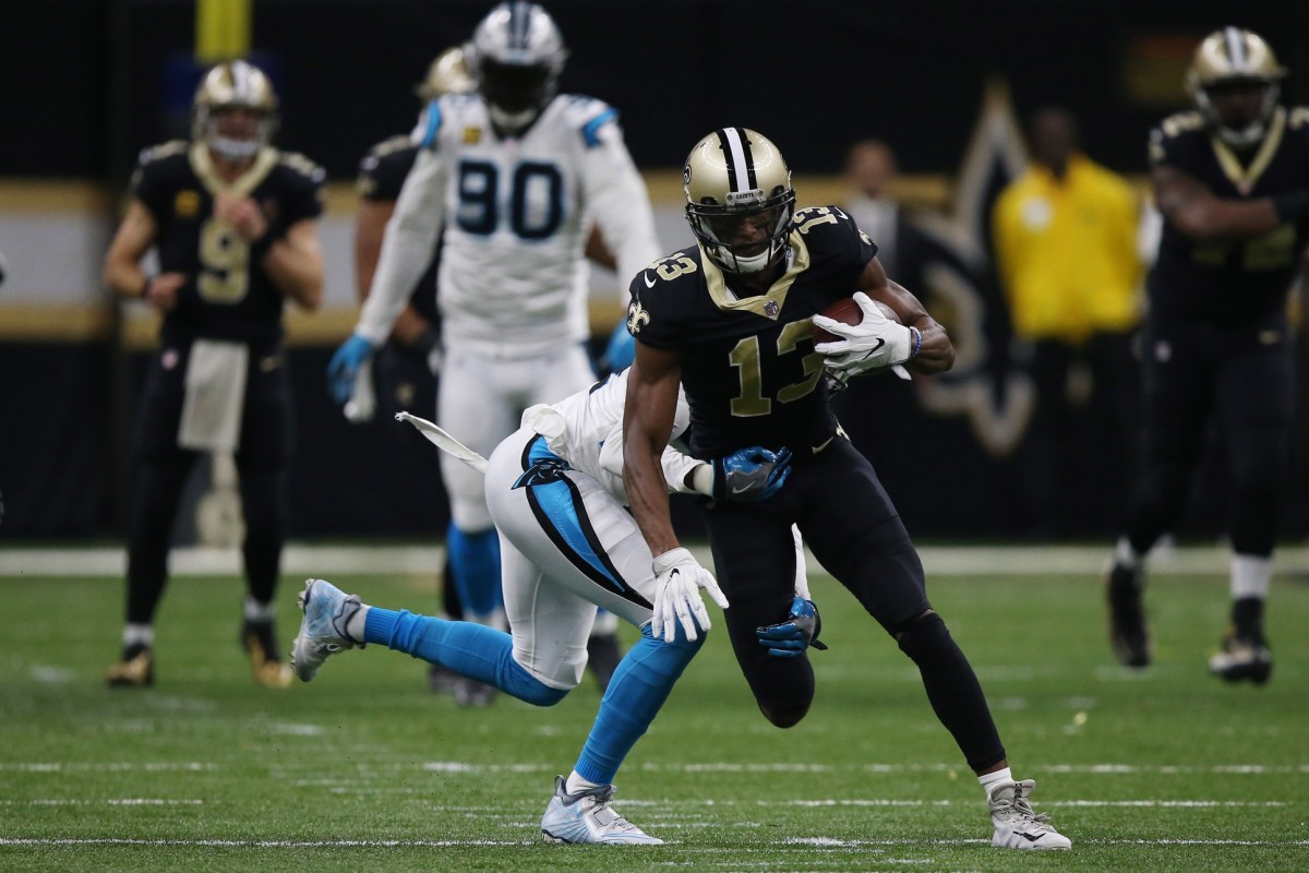 Jan 7, 2018; New Orleans, LA, USA; New Orleans Saints wide receiver Michael Thomas (13) catches a pass against Carolina Panthers cornerback James Bradberry (24) during the second quarter in the NFC Wild Card playoff football game at Mercedes-Benz Superdome. Mandatory Credit: Chuck Cook-USA TODAY