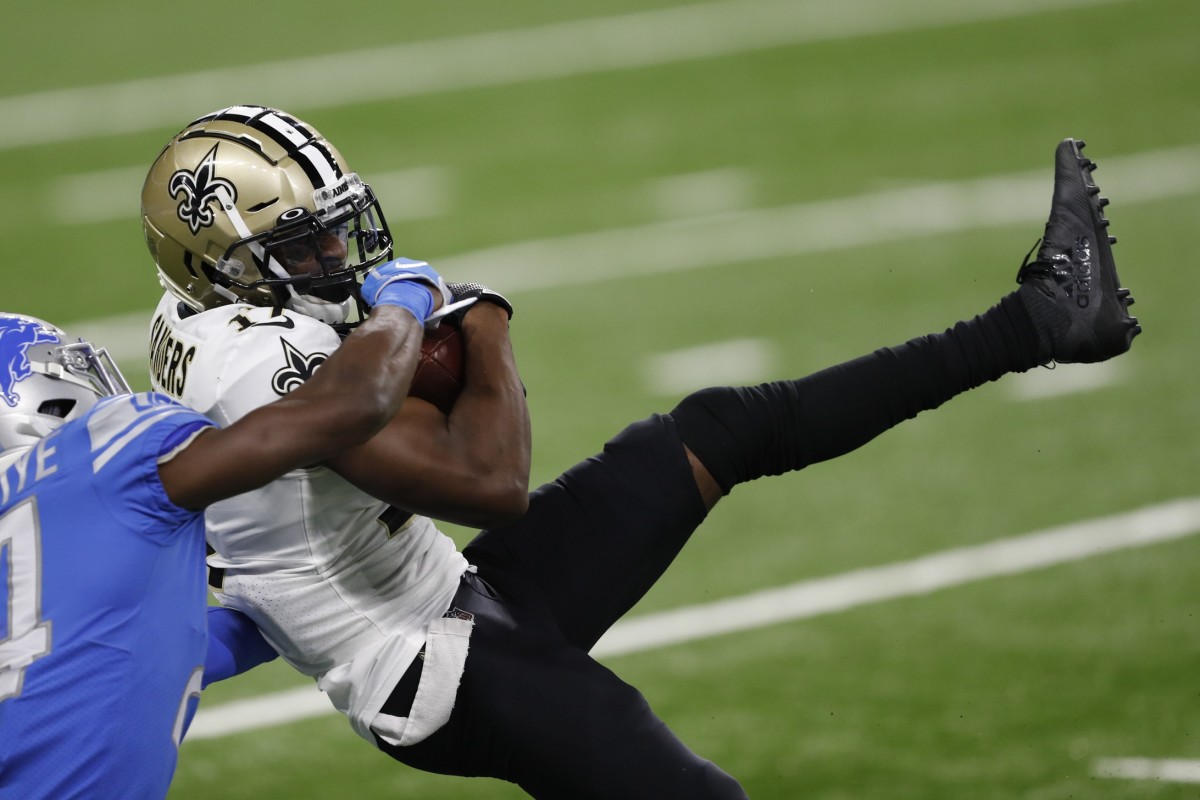 Oct 4, 2020; Detroit, Michigan, USA; New Orleans Saints wide receiver Emmanuel Sanders (17) makes a catch against Detroit Lions cornerback Amani Oruwariye (24) during the first quarter at Ford Field. Mandatory Credit: Raj Mehta-USA TODAY