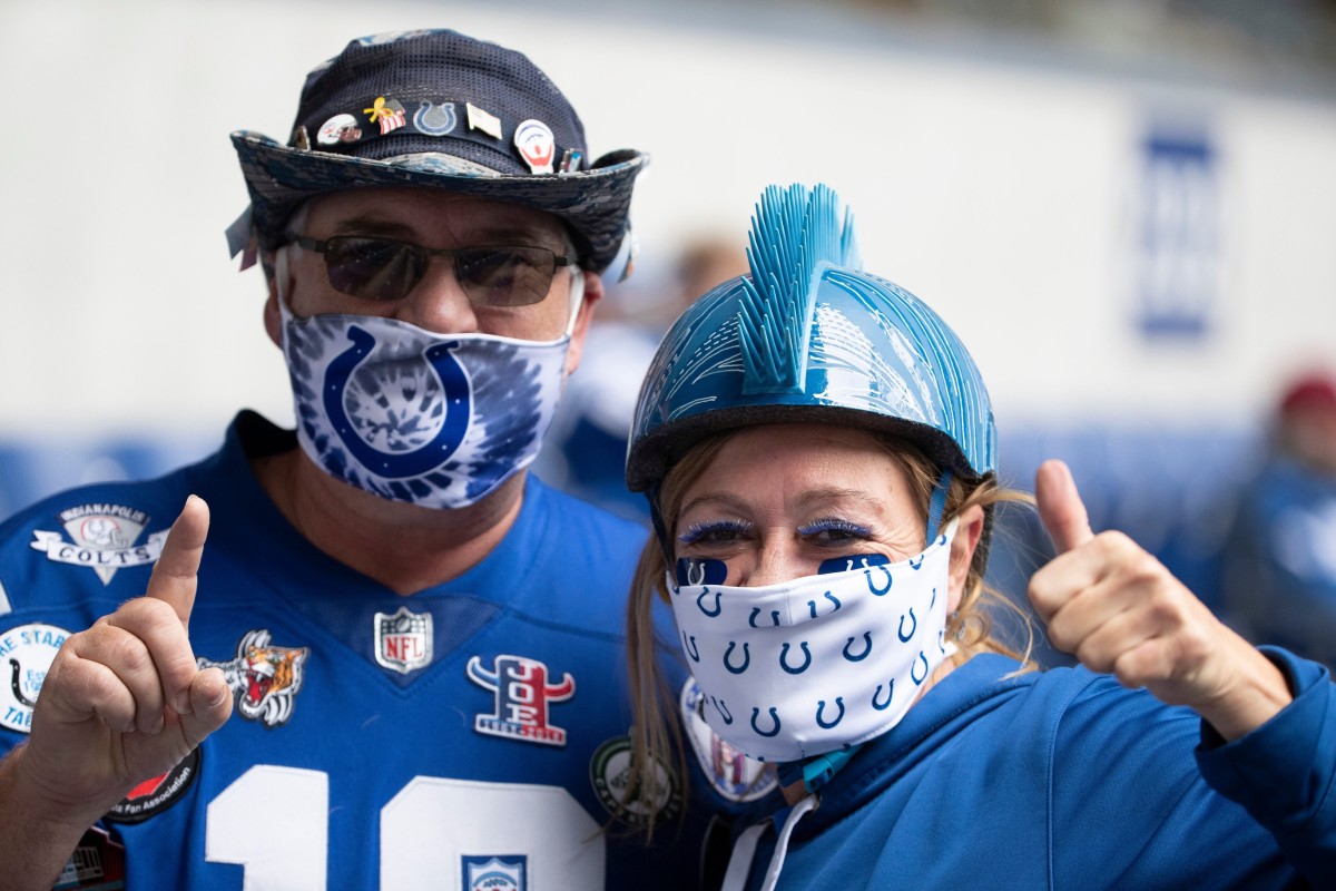 Two Indianapolis Colts fans are ready for Sunday's home win against the Cincinnati Bengals at Lucas Oil Stadium.