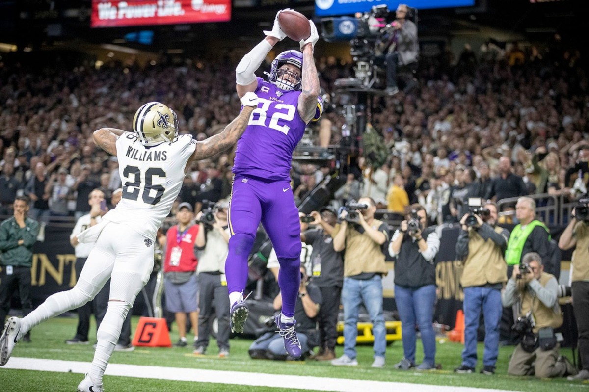 Jan 5, 2020; New Orleans, Louisiana, USA; Minnesota Vikings tight end Kyle Rudolph (82) catches a pass for the winning touchdown over New Orleans Saints cornerback P.J. Williams (26) during overtime of a NFC Wild Card playoff football game at the Mercedes-Benz Superdome. Mandatory Credit: Chuck Cook -USA TODAY