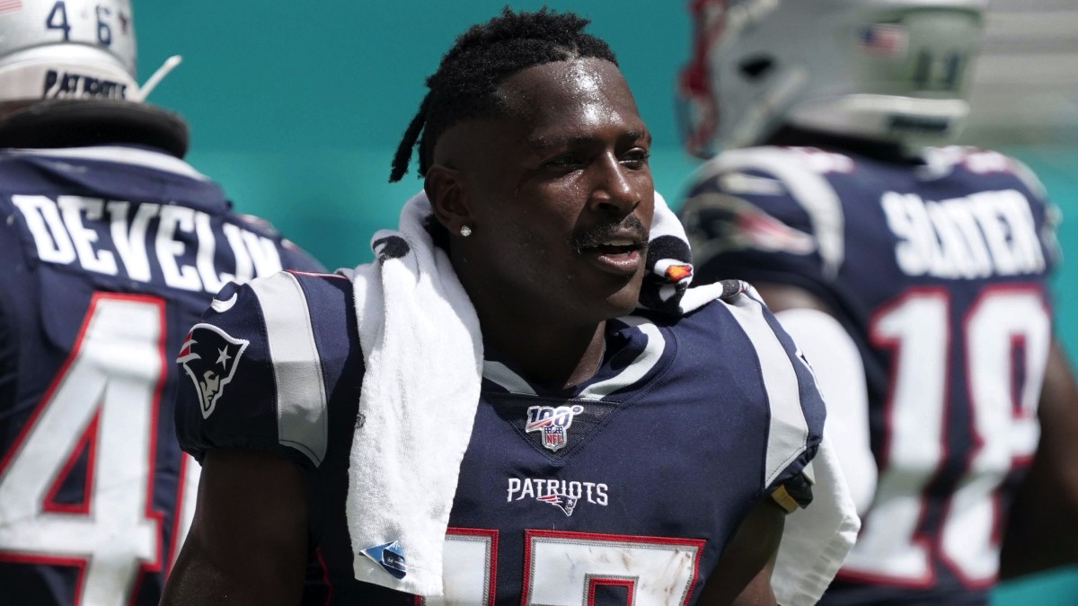 New England Patriots wide receiver Antonio Brown (17) watches from the sidelines in the second half against the Miami Dolphins at Hard Rock Stadium. The Patriots defeated the Dolphins 43-0.
