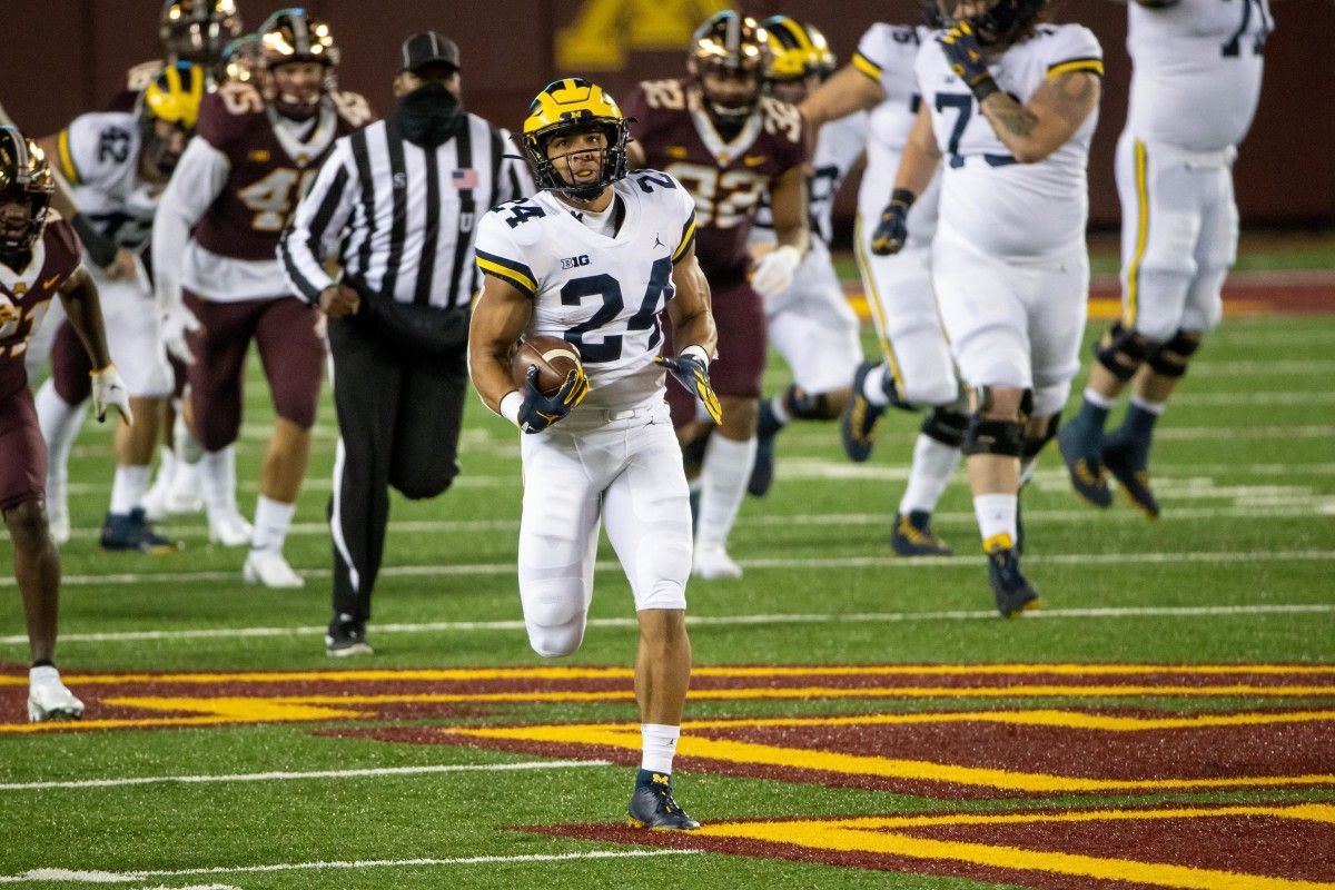 Zach Charbonnet runs away for his 70-yard score in the opening quarter.