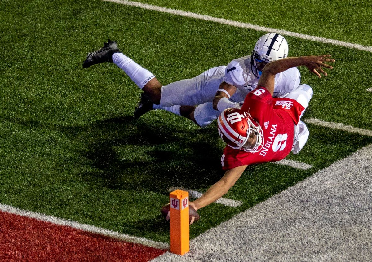 Michael Penix Jr. diving for the pylon, a ruling that ultimately stood in favor of IU.