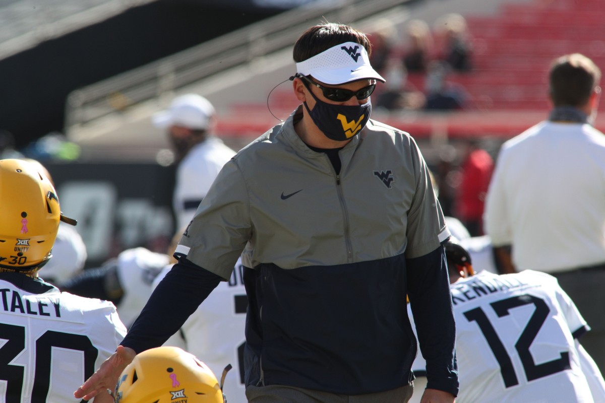 West Virginia Mountaineers head coach Neal Brown before the game against the Texas Tech Red Raiders at Jones AT&T Stadium.