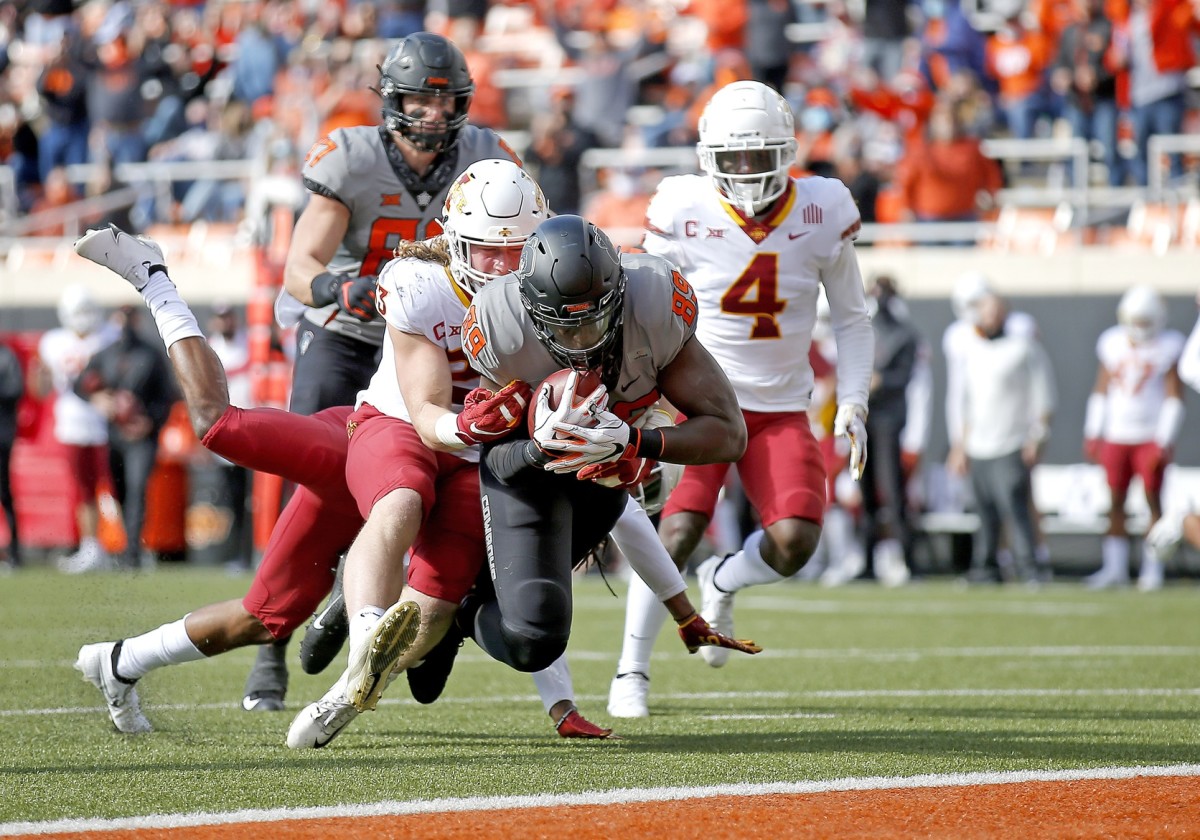 Jelain Woods gets into the end one on a touchdown reception in the No. 6 Cowboys win over No. 17 Iowa State.