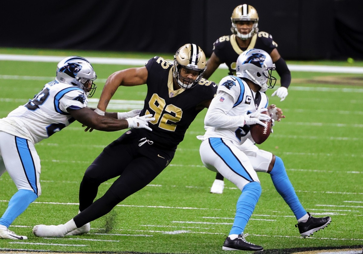 Oct 25, 2020; New Orleans, Louisiana, USA; New Orleans Saints defensive end Marcus Davenport (92) sacks Carolina Panthers quarterback Teddy Bridgewater (5) during the fourth quarter at the Mercedes-Benz Superdome. Mandatory Credit: Derick E. Hingle-USA TODAY