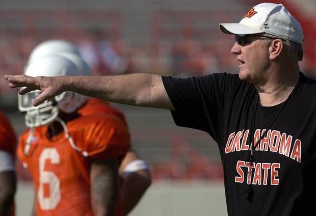 Bill Clay was once the defensive coordinator at Oklahoma State and is back as an analyst.