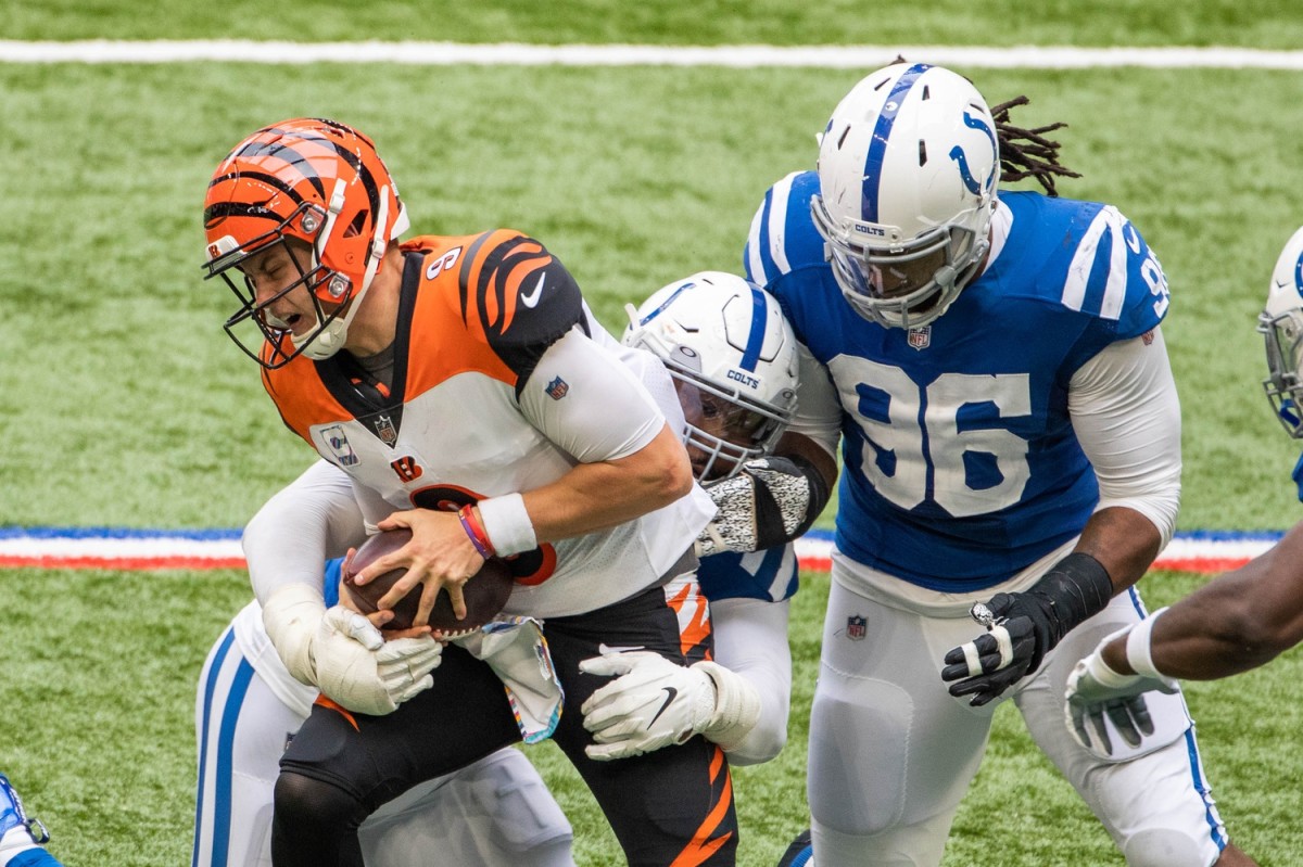 Indianapolis Colts defensive tackle DeForest Buckner sacks Cincinnati Bengals quarterback Joe Burrow in a Week 6 home win at Lucas Oil Stadium.