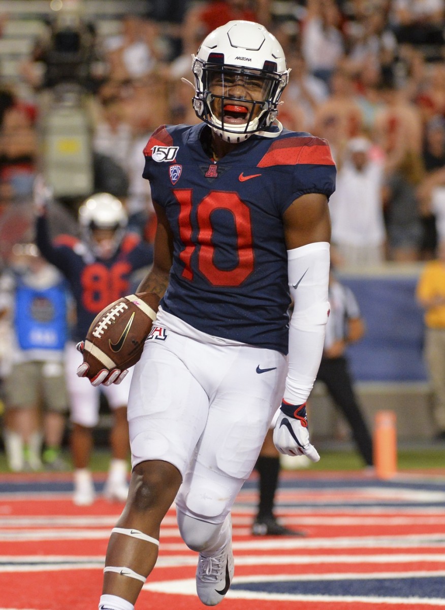 Sep 14, 2019; Tucson, AZ, USA; Arizona Wildcats wide receiver Jamarye Joiner (10) celebrates after scoring a touchdown against the Texas Tech Red Raiders during the second half at Arizona Stadium.