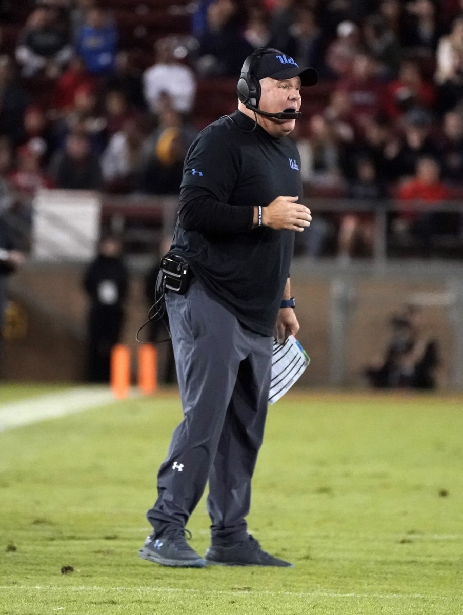 Oct 17, 2019; Stanford, CA, USA; UCLA Bruins coach Chip Kelly watches from the sidelines in the second quarter against the Stanford Cardinal at Stanford Stadium.