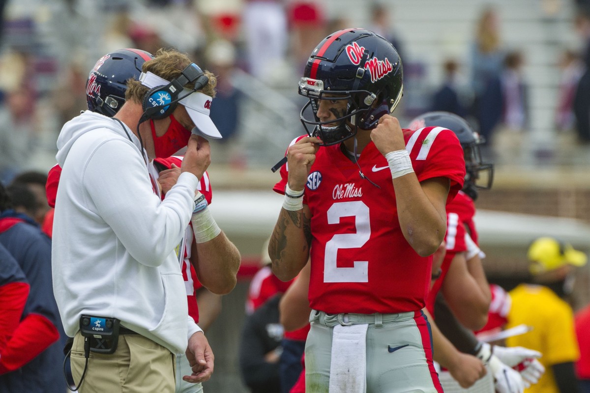 Mississippi Rebels head coach Lane Kiffin and Mississippi Rebels quarterback Matt Corral (2) during the second half against the Auburn Tigers at Vaught-Hemingway Stadium. Mandatory Credit: Justin Ford-USA TODAY Sports