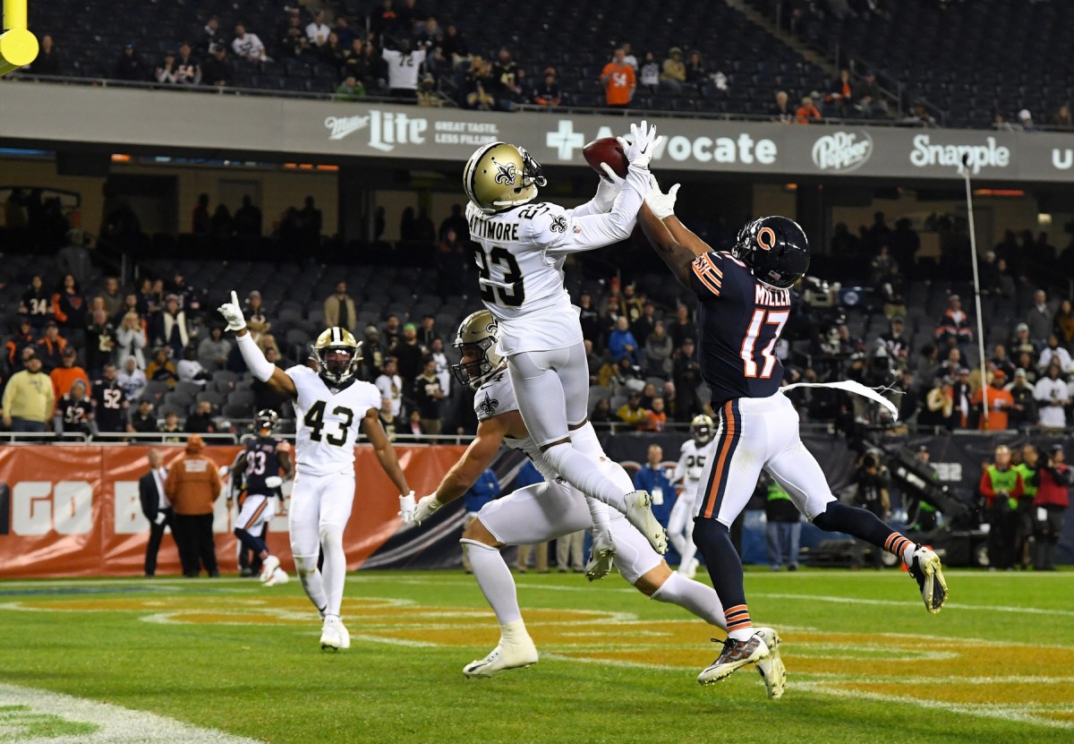 Oct 20, 2019; Chicago, IL, USA; New Orleans Saints cornerback Marshon Lattimore (23) and Chicago Bears wide receiver Anthony Miller (17) attempt to make a play on the ball during the second half at Soldier Field. Mandatory Credit: Mike DiNovo-USA TODAY 