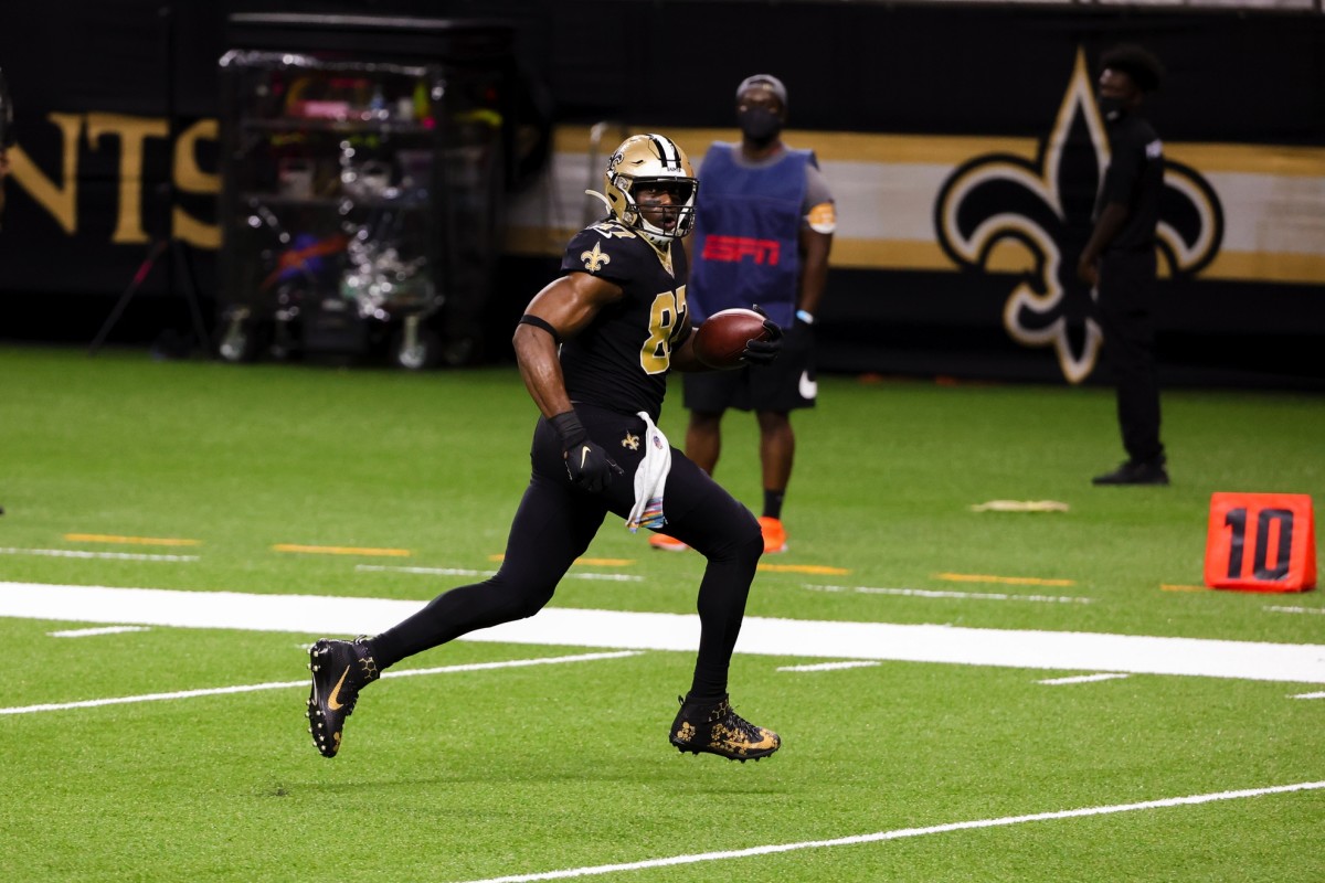 Oct 12, 2020; New Orleans, Louisiana, USA; New Orleans Saints tight end Jared Cook (87) catches a touchdown against the Los Angeles Chargers during the second half at the Mercedes-Benz Superdome. Mandatory Credit: Derick E. Hingle-USA TODAY