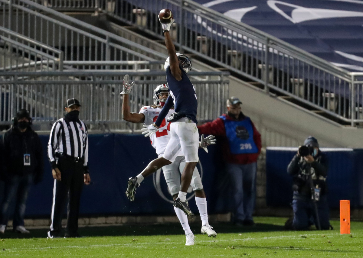 Penn State receiver Jahan Dotson makes one of his three touchdown catches against Ohio State in 2020. (Matthew O'Haren/USA Today Sports)