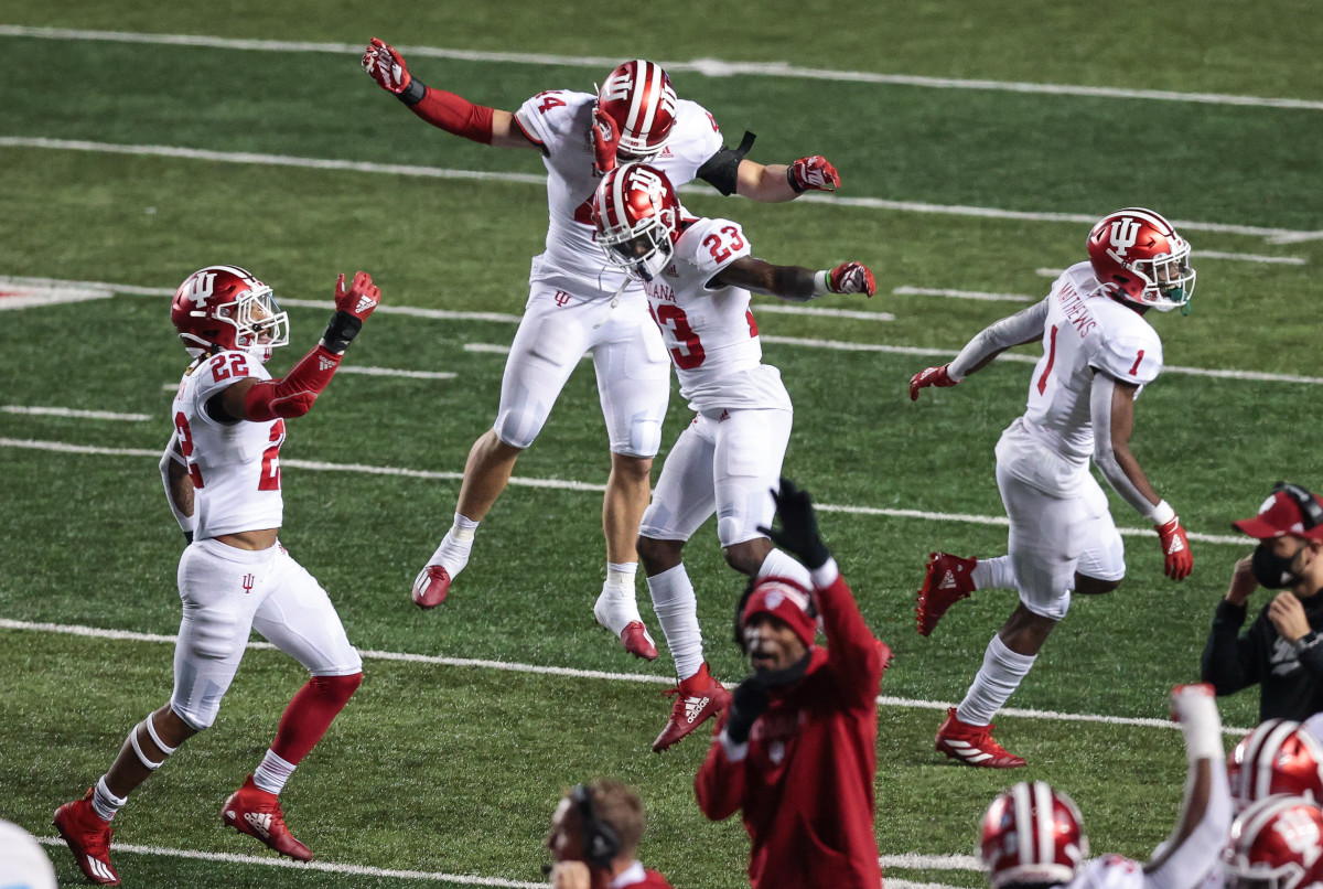 Indiana Hoosiers defensive back Jaylin Williams (23) and defensive back Devon Matthews (1) and defensive back Jamar Johnson (22) celebrate a defensive stop against the Rutgers Scarlet Knights