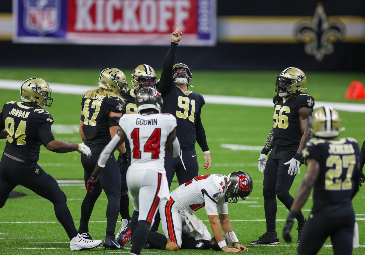 Sep 13, 2020; New Orleans, Louisiana, USA; New Orleans Saints defensive end Trey Hendrickson (91) celebrates after sacking Tampa Bay Buccaneers quarterback Tom Brady (12) during the second quarter at the Mercedes-Benz Superdome. Mandatory Credit: Derick E. Hingle-USA TODAY Sports