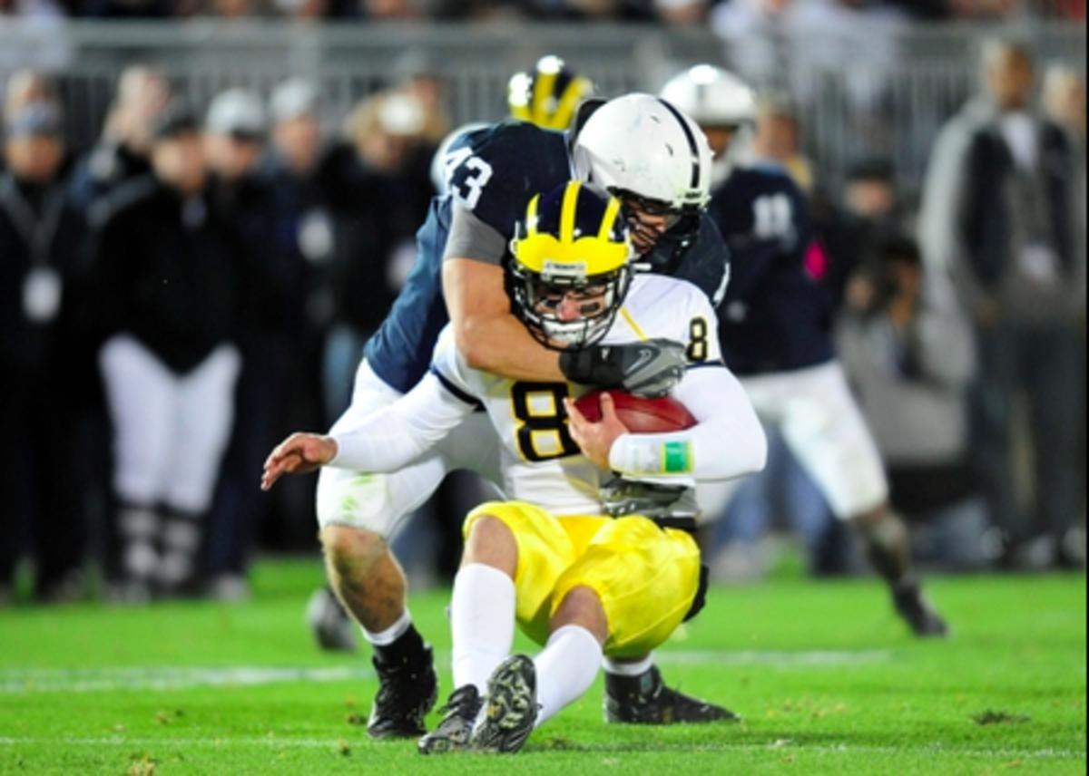 Nick Sheridan gets sacked by Penn State's Josh Hull during Michigan's 46-17 loss to the Nittany Lions. (James Lang/USA Today Sports)