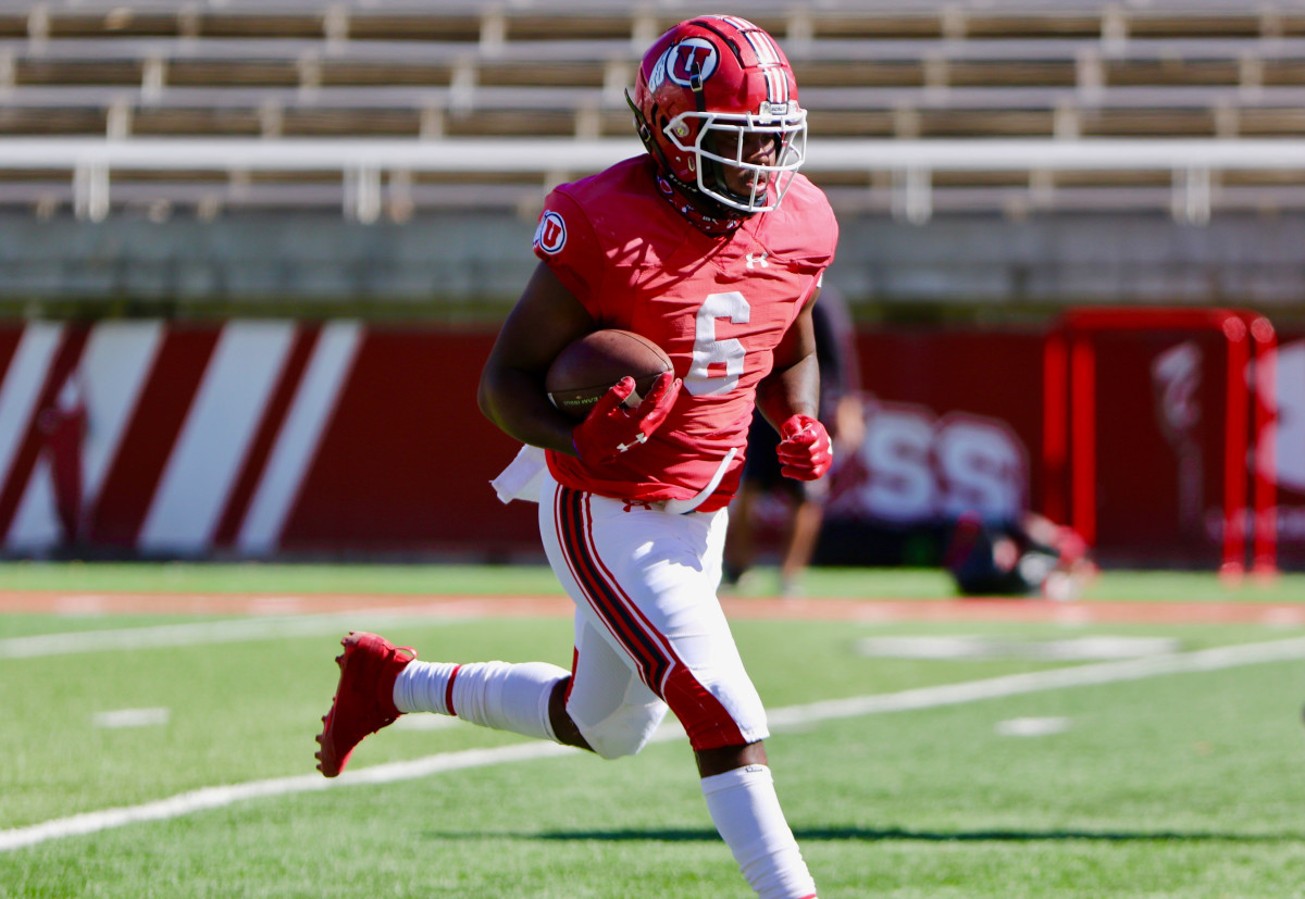 Utah running back Devin Brumfield carries the ball in a recent fall camp practice. Brumfield is locked in a battle to be the starter with Jordan Wilmore.