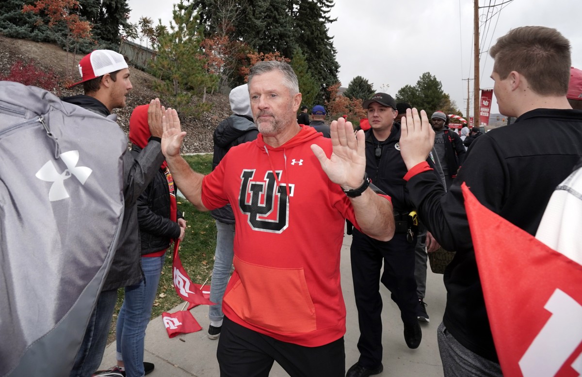 Oct 19, 2019; Salt Lake City, UT, USA; Utah Utes head coach Kyle Whittingham greets fans during the Ute Walk outside of Rice-Eccles Stadium prior to the game against the Arizona State Sun Devils.