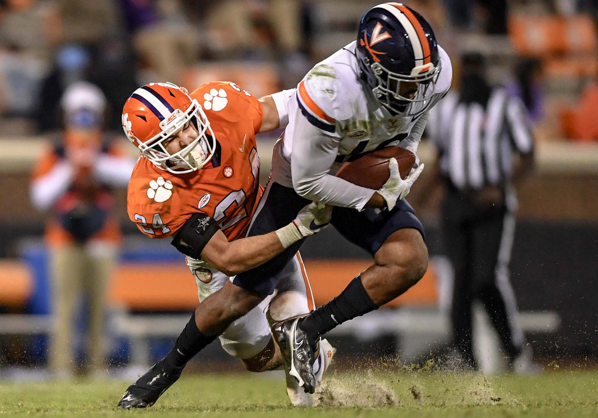 Clemson's Nolan Turner tackles a Virginia player